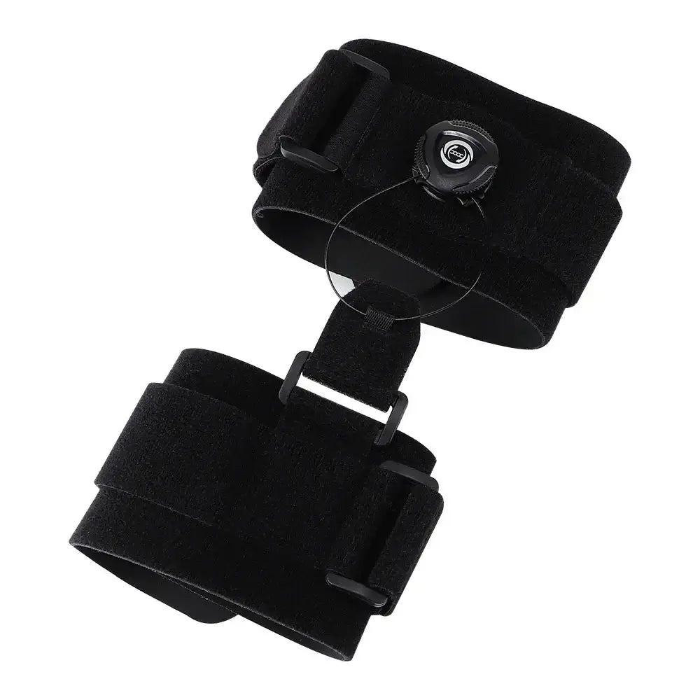 Adjustable black foot orthosis splint with swivel button for plantar fasciitis pain relief.