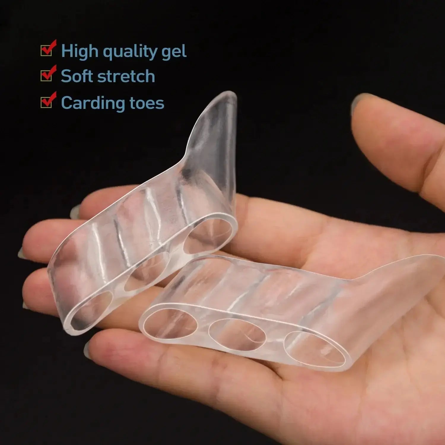 Transparent silicone gel toe straightener in hand, designed for foot pain relief and comfort.