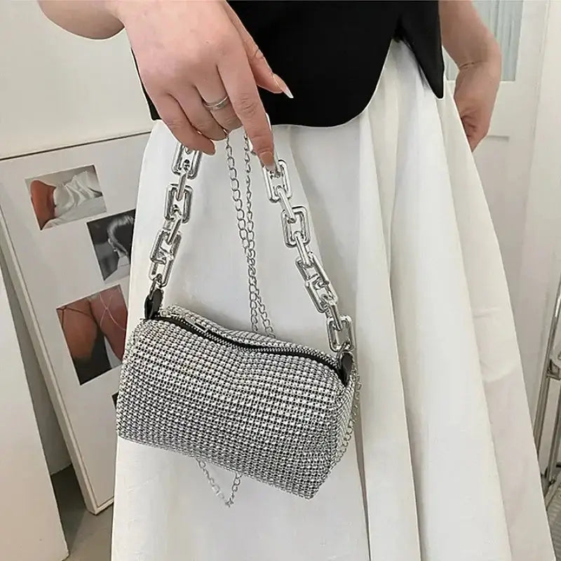 Chic allover rhinestone bucket bag with glittery chain, perfect for women as a mini crossbody purse.