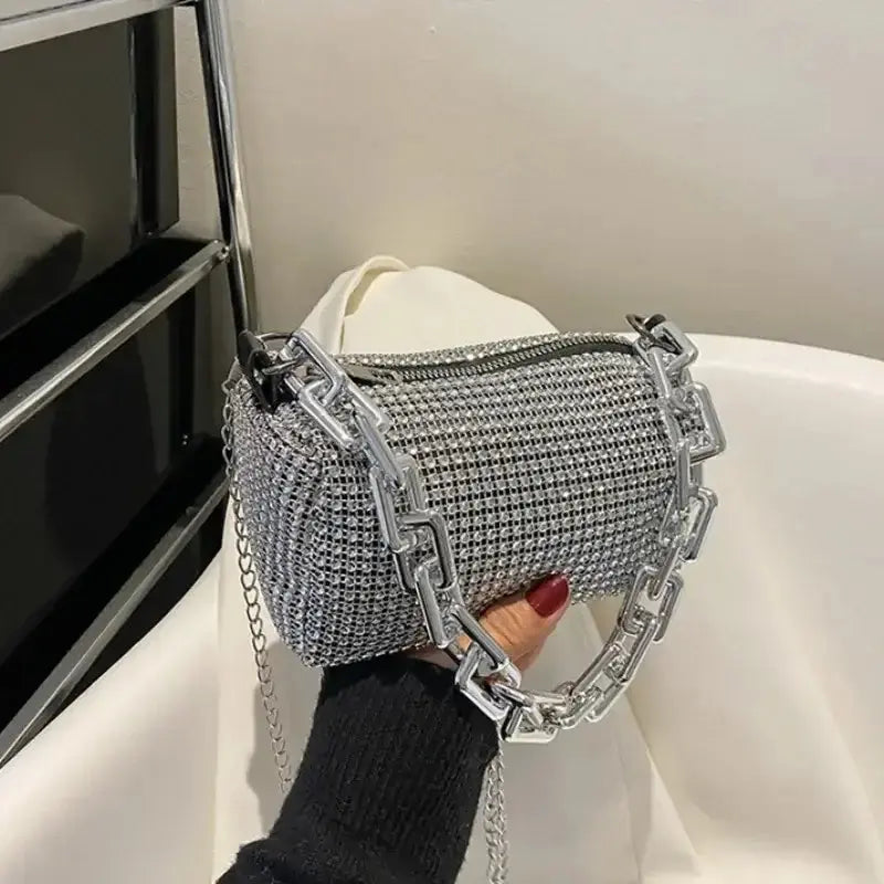 Allover rhinestone bucket bag with glitter chain, stylish mini crossbody purse for women.