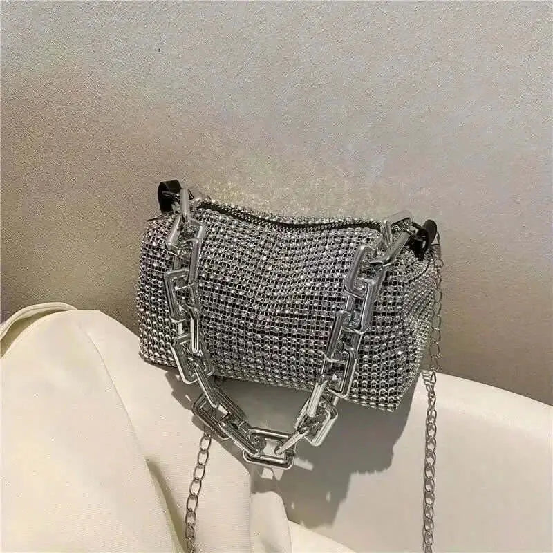 Allover rhinestone bucket bag with glitter chain, stylish mini crossbody purse for women.