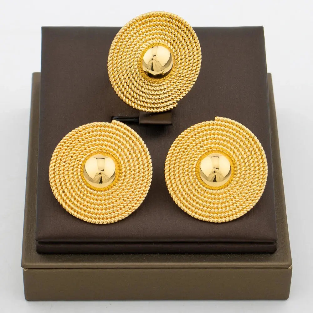 Gold-tone African-style jewelry set with necklace, earrings, bangle, and ring for weddings or parties.