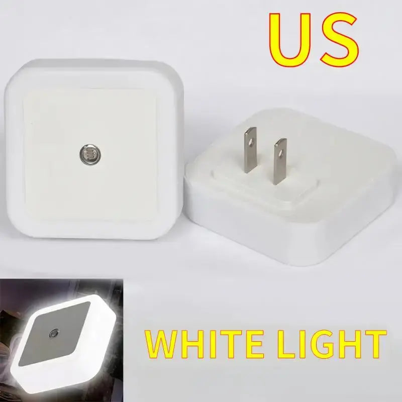 US plug LED night light with motion sensor, compact design for hallway or bedroom use, emits white light.