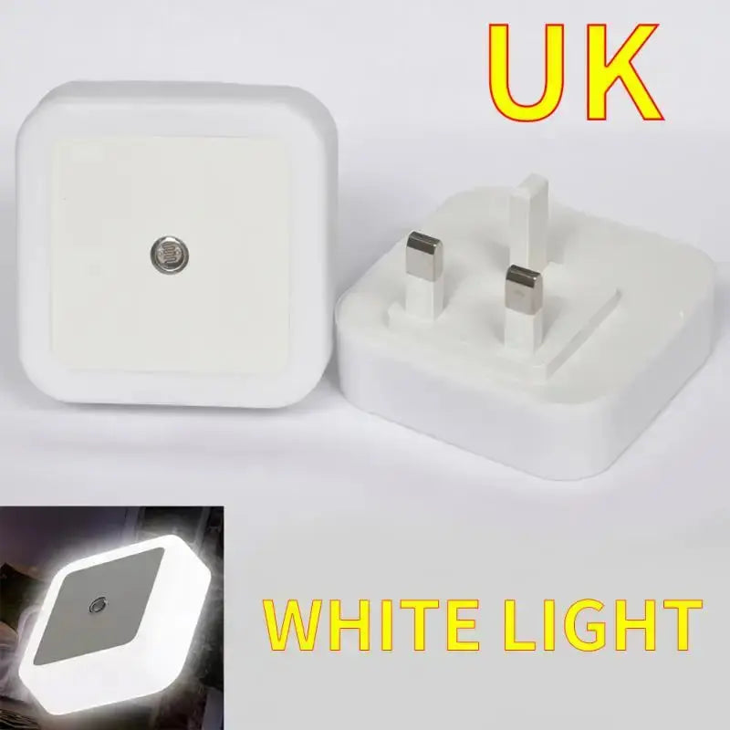 UK plug LED night light with motion sensor, compact design for hallways and bedrooms, emits white light.