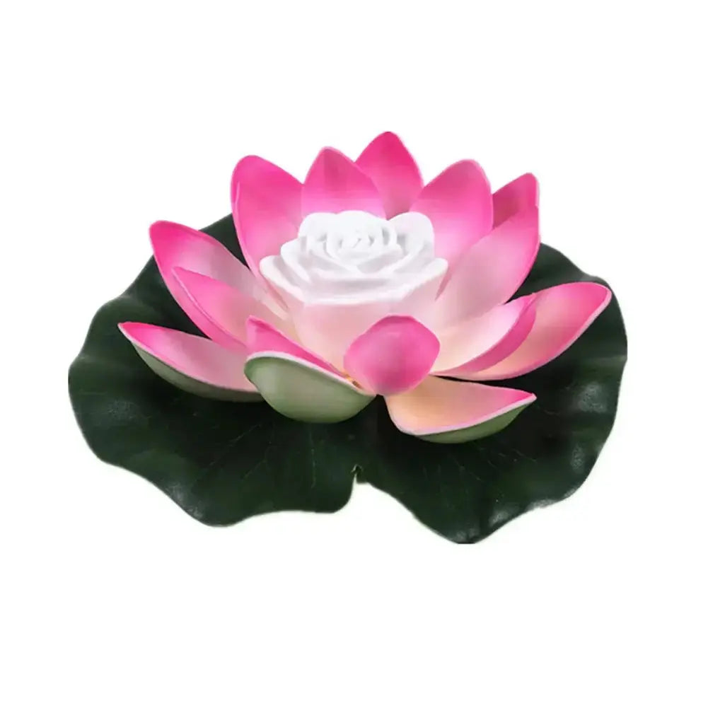 Lampe LED flottante en forme de lotus, décorative pour étang ou piscine, avec pétales roses et feuille verte.