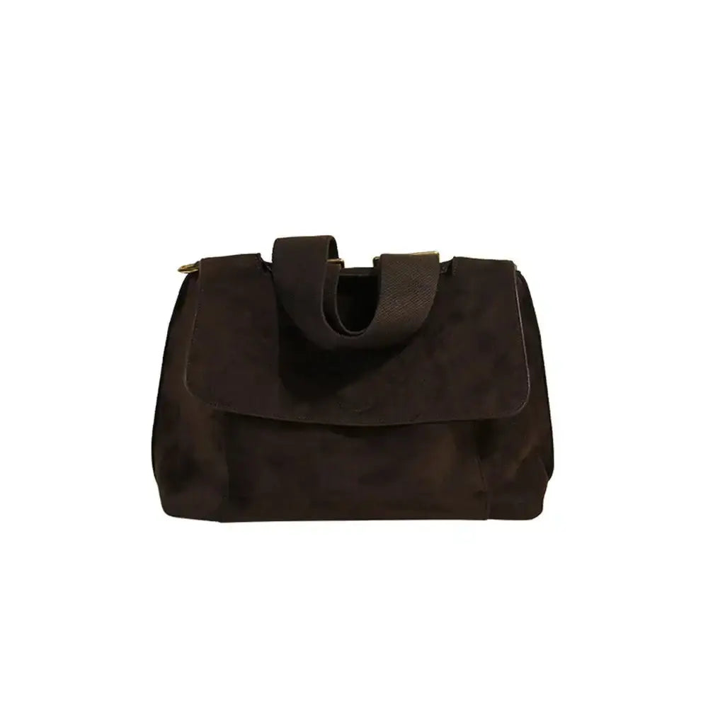 Sac à bandoulière en cuir marron foncé avec anses élégantes, idéal pour un style décontracté.