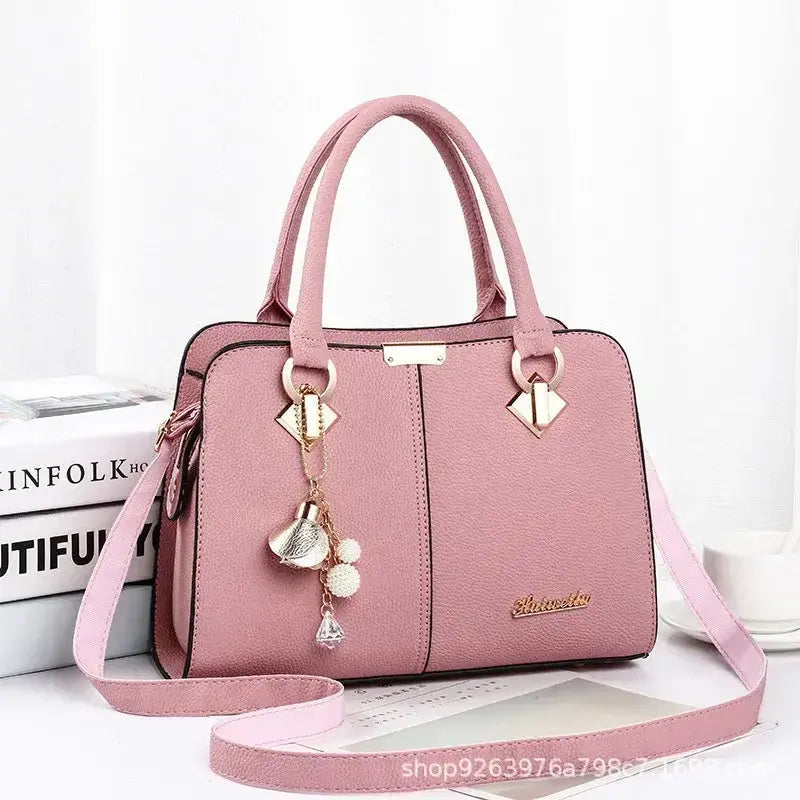 Nouveau sac à bandoulière pour femme, sac à main rose avec décorations élégantes, style mode et grande capacité.