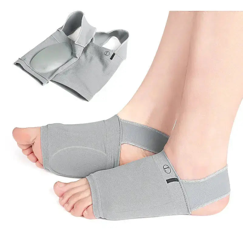 Arch support sleeves for flat foot and plantar fasciitis relief on a pair of feet, showcasing compression brace design.