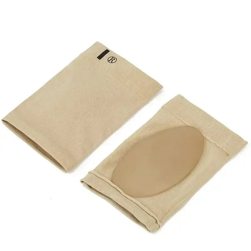 Pair of beige arch support sleeves for metatarsal compression and flat foot support, ideal for plantar fasciitis relief.