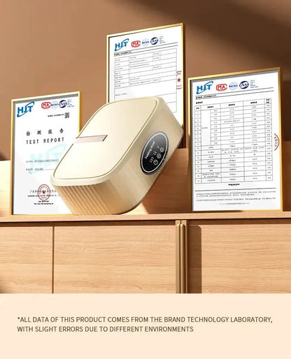 Electric clothes dryer with test reports displayed on a wooden cabinet.