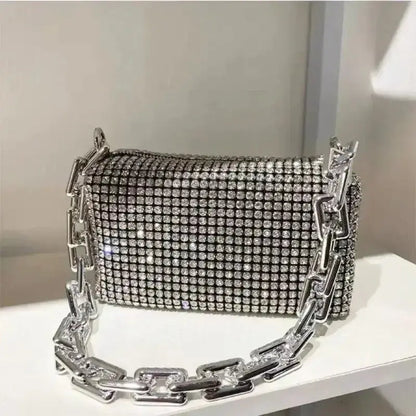 Allover rhinestone bucket bag with glitter chain strap, perfect for prom or versatile occasions.
