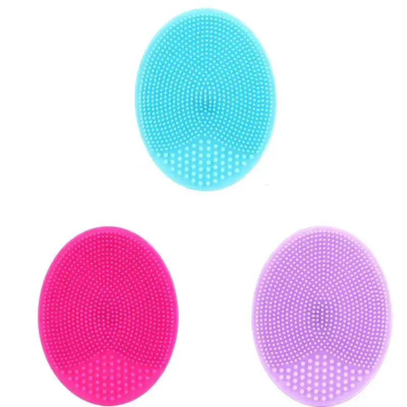 Brosse nettoyante pour le visage en silicone, disponible en bleu, rose et violet, pour nettoyage en profondeur des pores.