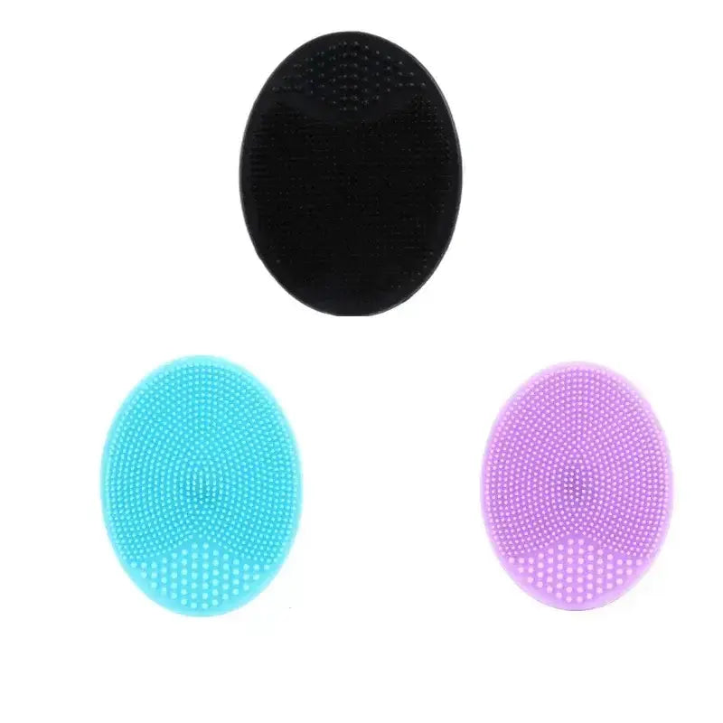 Set of three silicone facial cleansing brushes in black, blue, and purple for deep pore cleaning and exfoliation.