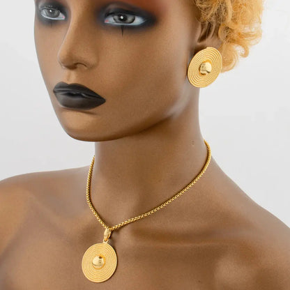 Gold-tone African-style jewelry set with necklace, earrings, bangle, and ring for weddings or parties.
