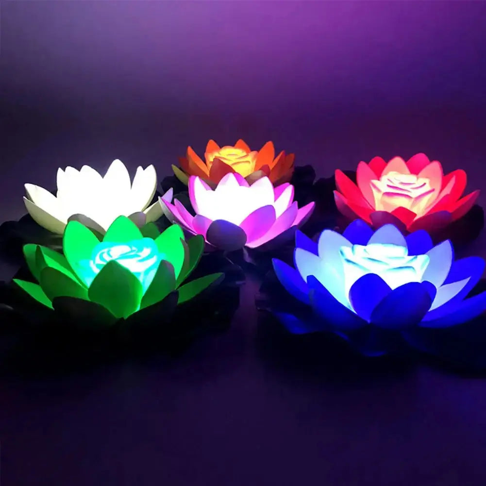 Colorful LED lotus floating lights for decorative ponds, gardens, and aquariums.