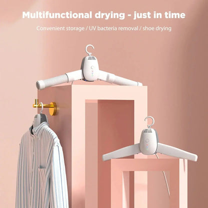 Mini foldable dryer for clothes and shoes with UV bacteria removal, featuring convenient storage and multifunctional design.