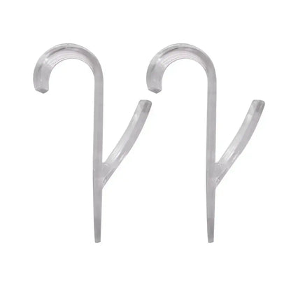 Clear plastic hooks for hanging garments or accessories, suitable for organizing and drying clothes.