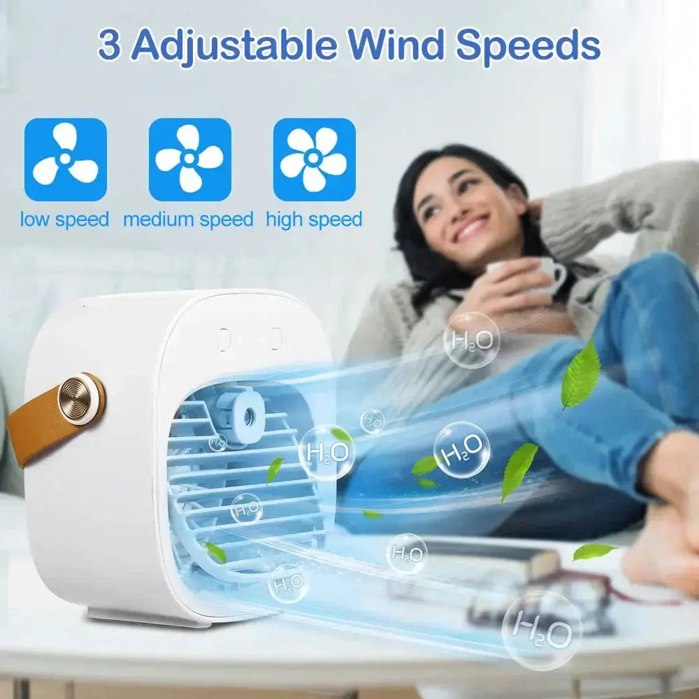 Portable air conditioner with 3 adjustable wind speeds in a cozy indoor setting, providing a refreshing cool breeze.