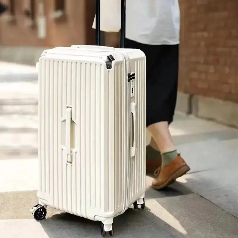 Valise multifonctionnelle légère avec roulettes, design moderne, port USB et porte-gobelet, prête pour les voyages.